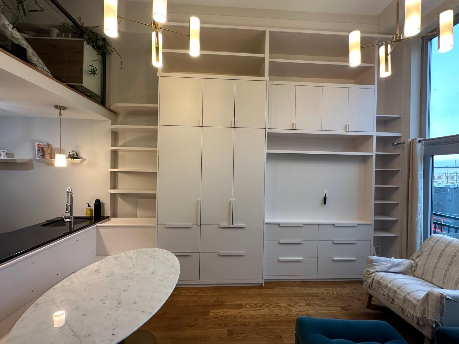 Finished millwork wall — full elevation with drawer bank and open TV niche