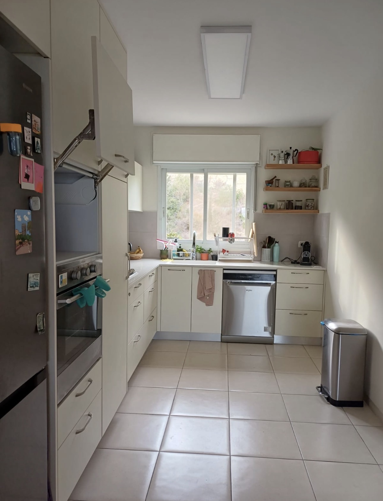New kitchen — pantry wall with integrated fridge, wall ovens and drawer bank